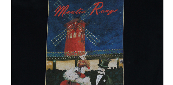 colorful screen print of Moulin Rouge art on a black shirt